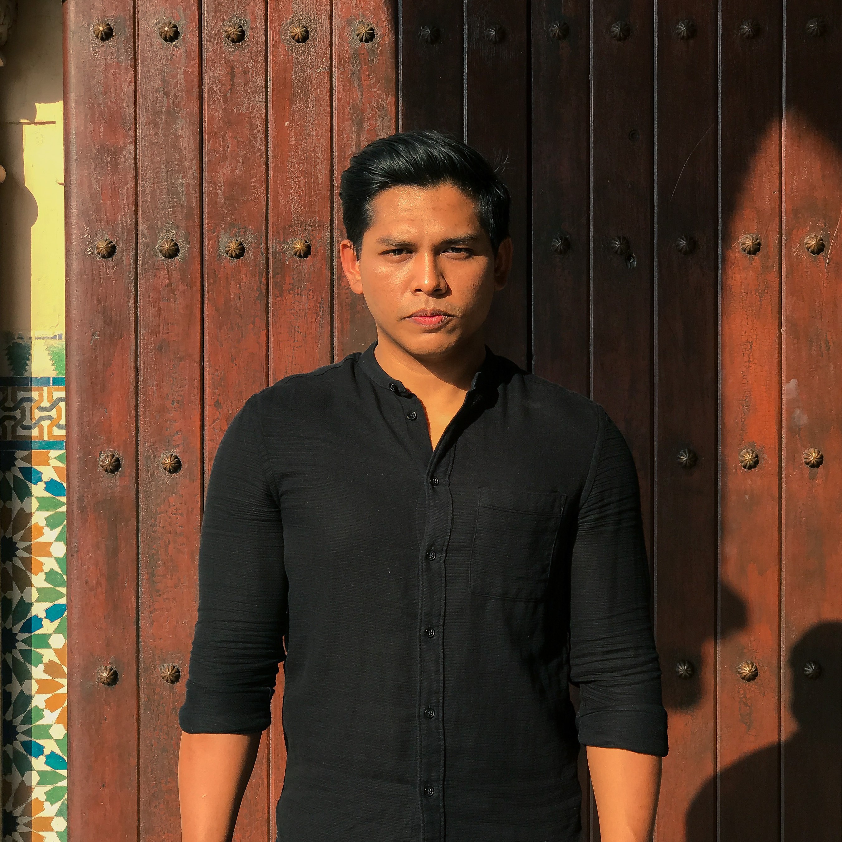 Zairul Puad holding a camera